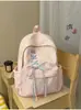 Mochila transfronteiriça de novo estilo para meninas do ensino fundamental, estilo coreano, moderna e versátil para estudantes do ensino médio, leve para a escola e para o dia a dia.