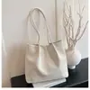 Bolso tote simple mate para mujer, nuevo estilo otoño e invierno 2025, bolso de hombro versátil vintage, bolso de mano para el trabajo
