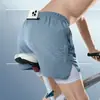 Pantalones Cortos Deportivos para Hombre Correr Maratón Atletismo Sueltos de Tres Puntos Forro de Secado Rápido Anti-Exposición Doble Capa Pantalones Cortos de Fitness