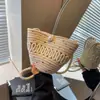 Bolsas Populares de Este Año para Mujer 2023 Nuevo Diseño de Nicho Bolso de Hombro Único Cruzado Bolso Cubo Tejido Único de Verano Versátil