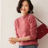 Suéter base liso de cachemir de cuello alto medio, holgado y estilizado, engrosado para otoño e invierno, tejido de manga larga para mujer con hombro normal