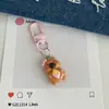 Chaveiro Flor Capi com Laço Rosa Boneca Desenho Animado Pingente Pequeno Corrente para Pendurar Celular Pingentes Coração de Menina