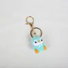Exquisito pingüino pequeño llavero tejido a mano tejedor lana ganchillo pequeño colgante original hecho a mano animal caramelos de gelatina