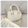 Bolso de Mano Pequeño de Moda para Mujer 2026 Nuevo Modelo Bolso Compacto Tipo Bowling Versátil Bolso Cruzado al Hombro Bolso para Lipstick Bolso tipo Concha