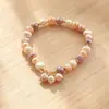 Collar Baroque Irregular de Perlas de Agua Dulce Rosadas, Blancas y Moradas con Elegante Colgante de Perla de Colores Caramelo y Cierre Ot Gargantilla