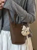 Bolso de mujer grande, moderno y sencillo, modelo nuevo 2026, bolso de hombro para el trabajo con un toque de alta gama, bolso de mano, bolso tote, bolso tipo cubo
