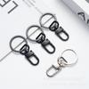 Fabricantes suministro aleación de zinc negro electroforesis llavero juguete joyería hebilla colgante electroforesis hebilla perro hebilla caja bolsa hebilla