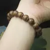 Cuentas de linterna de madera 12 mm pulsera pulsera estilo nacional simple joyería para hombres y mujeres Wen juega cuentas de Buda cuentas de rosario al por mayor