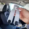 Gancho doble multifuncional de cuero para coche para reposacabezas y asiento, instalación no destructiva para guardar bolsas y artículos varios en el coche