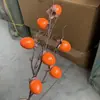 Fruta de caqui artificial de Natal, flores artificiais para decorações de Ano Novo em casa, galhos de árvore de frutas artificiais, romã de 7 cabeças, flores artificiais no atacado