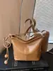 Bolso retro simple transfronterizo para mujer 2026 nuevo bolso de hombro cruzado casual versátil para el trabajo y los desplazamientos bolso tipo cubo