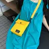 Bolsa para teléfono móvil de mujer, bolso pequeño cruzado, bolso mini de lona simple, bolso de hombro vertical versátil de moda, monedero para llaves y monedas