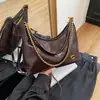 Bolsa de Hombro Estilo Nuevo Primavera 2025 Cuero Encerado Francés Cubo Hombro Cruzada Axila para Mujer Gran Capacidad Versátil