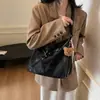 Bolso vintage de gran capacidad para mujer, nuevo modelo otoño e invierno 2026, mochila súper popular para el día a día, bolso de hombro moderno y versátil de múltiples usos