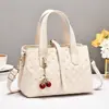 Bolso de mano moderno para mujer para el trabajo, nuevo bolso pequeño de moda versátil con patrón de diamantes, estilo de lujo ligero, para llevar al hombro y cruzado para mujer
