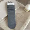 Calcetines de maternidad versátiles sin costuras de principios de otoño, calcetines casuales de algodón hasta la pantorrilla con efecto holgado, calcetines largos de color liso estilo ins para niñas en tonos café