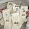2026 Novas Meias Quentes de Pelúcia Grossa, Macias e Versáteis, de Alta Aparência, com Laço para Outono e Inverno