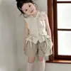 Conjunto de Niña 2026 Verano Nuevo Elegante Conjunto Infantil con Bordes Volantes, Top de Lunares Ajustado a la Cintura y Shorts Holgados para Niñas