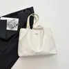 Bolsa Tote Casual Cor Lisa Transfronteiriça Nova Moda 2025 Textura para o Dia a Dia Grande Capacidade com Laço no Ombro ou Axila para Mulheres