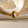 Anillo de Acero Inoxidable Transfronterizo Flor Amor No Se Desvanece Temperamento Diseño de Circonita Suministro de Anillo de Acero de Titanio de Alta Gama