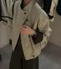 Chaqueta de moda estilo coreano con cuello alto para mujer, nuevo modelo de otoño 2026, bloques de color, corte holgado, versátil, con puños con paneles de cuero