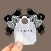 Pinza de Garra Pequeña con Flequillo Lateral Estampado de Leopardo y Pasador de Moño para Niñas 2026 Nuevo Estilo Accesorio de Cabello de Princesa de Gama Alta Otoño e Invierno