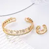 Moda europea y americana nueva alta calidad popular oro de 18 quilates y plata diamante 2 filas pulsera abierta pulsera de mujer joyería explosión