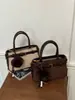 Bolsas Coreanas de Nicho Otoño 2026 Nuevo Bolso Cuadrado Pequeño de Mano Elegante Bolso de Mujer Más Vendido Bolso Cruzado de Hombro Único Francés