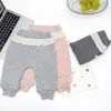 Pantalones de forro polar para niñas con estampado de lunares para otoño e invierno, con ribete de encaje y cintura fruncida, pantalones jogger para bebé al por mayor
