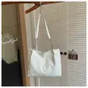 Bolsa tote de grande capacidade para estudantes, adequada para a aula e o trajeto, design de nicho estiloso, bolsa de ombro casual