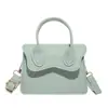 Bolsa de Mão Feminina da Moda 2025 Novo Verão Moda Padrão Cascalho Simples e Elegante Bolsa Transversal de Ombro Único