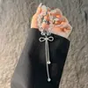 Colección original de alta gama de dijes para teléfono de cristal brillante de lujo ligero, colgantes de borla, llaveros y accesorios para bolsos