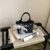 Bolso de Mano Nuevo de Lunares con Lazo para Mujer 2026, Bolso Cruzado de Nicho Estilo Coreano, Bolso de Hombro Versátil de Moda de Gama Alta
