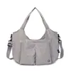 Bolsa de Ombro 2026 Simples Casual Grande Capacidade Mochila de Tecido Oxford Baistu Nova Moda Bolsa para o Dia a Dia Atacado