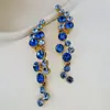 Pin de Oreja Asimétrico Brillante con Adorno de Cristal de Lujo Accesible de Alta Gama Oscar Fashion para Mujer