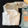 Camisa casual de manga larga de dos piezas falsas con cadena, diseño nicho, para mujer, nueva de Otoño 2026