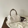 Bolsa de Mão de Pelúcia de Cor Sólida de Alto Valor Nova Chegada Outono 2026 Bolsa de Ombro Único Moda Fofa para o Dia a Dia Bolsa Transversal Tendência