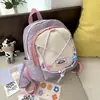 Mochila Pequeña Fresca y Versátil para Niñas, Adecuada para Salidas de Primavera, Ligera y Compacta, Mochila Escolar Primaria con Bloques de Color de Nicho