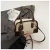 As bolsas pequenas populares deste ano para mulheres, versáteis para outono e inverno 2026, nova moda retrô, bolsa de ombro único, bolsa transversal, bolsa de mão, bolsa almofada