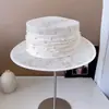 Chapéu de luxo leve, fio de cânhamo filipino, fita de pérola, chapéu plano feminino, primavera e verão, todos os tipos de proteção solar, chapéu de palha, moderno