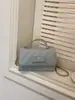2026 Novo Estilo Bolsa Quadrada Pequena com Corrente Losangular Bolsa Transversal para Mulheres Moda Coreana Versátil Bolsa para o Dia a Dia Bolsa de Ombro Feminina