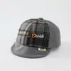 Al por mayor Otoño 2026 Lana Cálida Gorra de Pato para Bebé Estilo Coreano Serie a Cuadros para Niños y Niñas Sombrero de Ala Suave de Moda para Bebé