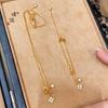 Tienda de oro Puzuo, mismo estilo, anillo de oro Sha Running, collar de flores de cuatro hojas, nicho de lujo ligero para mujer, cadena de lana de alta gama que combina con todo.