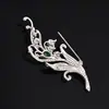 Broche de Lirio del Valle con Diamantes de Color Azul Verdoso Incrustados en las Ramas y Hojas, un Accesorio Elegante para el Trabajo, Eventos Nocturnos y Uso Versátil. Broches al por mayor