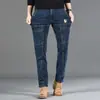 Jeans casuales de alta gama estilo americano de alta calle, ajustados, multibolsillos, para comercio exterior transfronterizo, disponibles en cuatro colores 2026