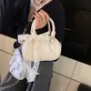Bolso de mano para mujer, bolso de hombro simple y elegante, nuevo bolso coreano de verano 2026, adecuado para ir de compras y para el día a día, bolso cruzado único
