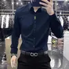 Camisa de manga larga negra de alta gama para hombre, marca francesa, corte slim fit, transpirable, botones ocultos, camisa sin costuras, nuevo modelo de primavera