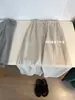 2025 Lyocell Tencel Linho Casual Moda Versátil Solto Confortável Calça Reta de Nove Pontos Cor Sólida Versátil Feminina
