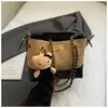 Bolso de Mano Retro Sencillo Bolso Cubo para Mujer 2026 Nuevo Estilo Bolso Tote con Cadena de Rombo Bolso de Hombro Único Bolso Cruzado Lujo Ligero