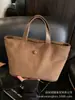 Bolso Tote de Gamuza de Gran Capacidad para Mujer 2025 Nuevo Bolso de Mano Trendy de Alta Gama para Salir a Trabajar y Bolsa para Desplazamientos